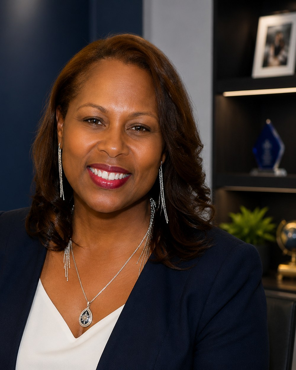 Cherron Woods-Seals, Co-Founder & COO of TriActs Synergy Holdings, professional executive portrait